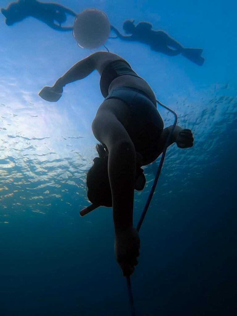 duck diving head first while on a line