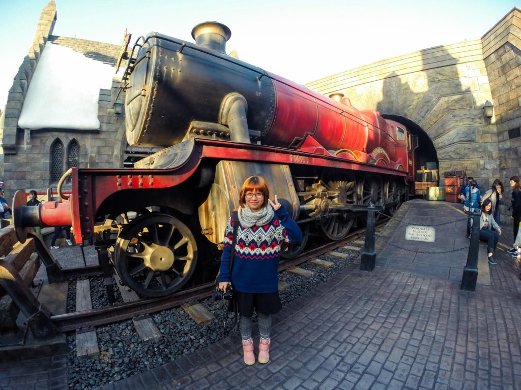 woman at the Hogwarts Express in the Wizarding World of Harry Potter
