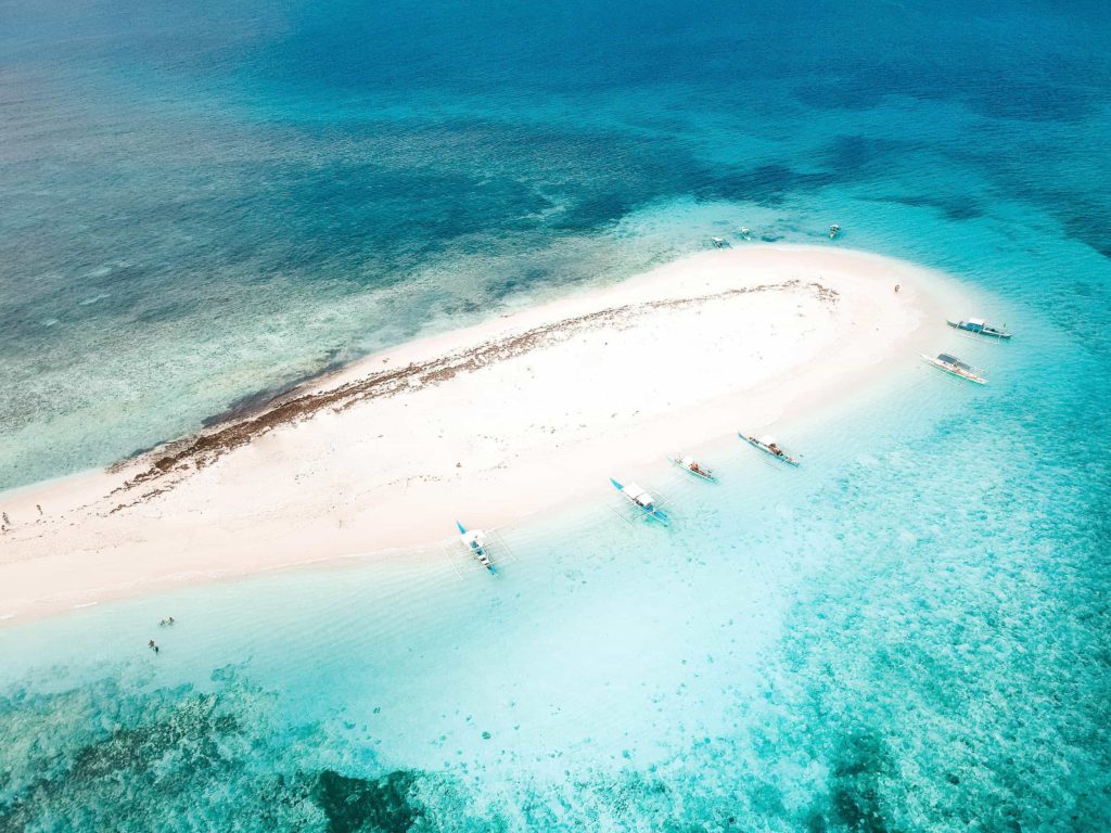 aerial shot of Naked Island in Siargao