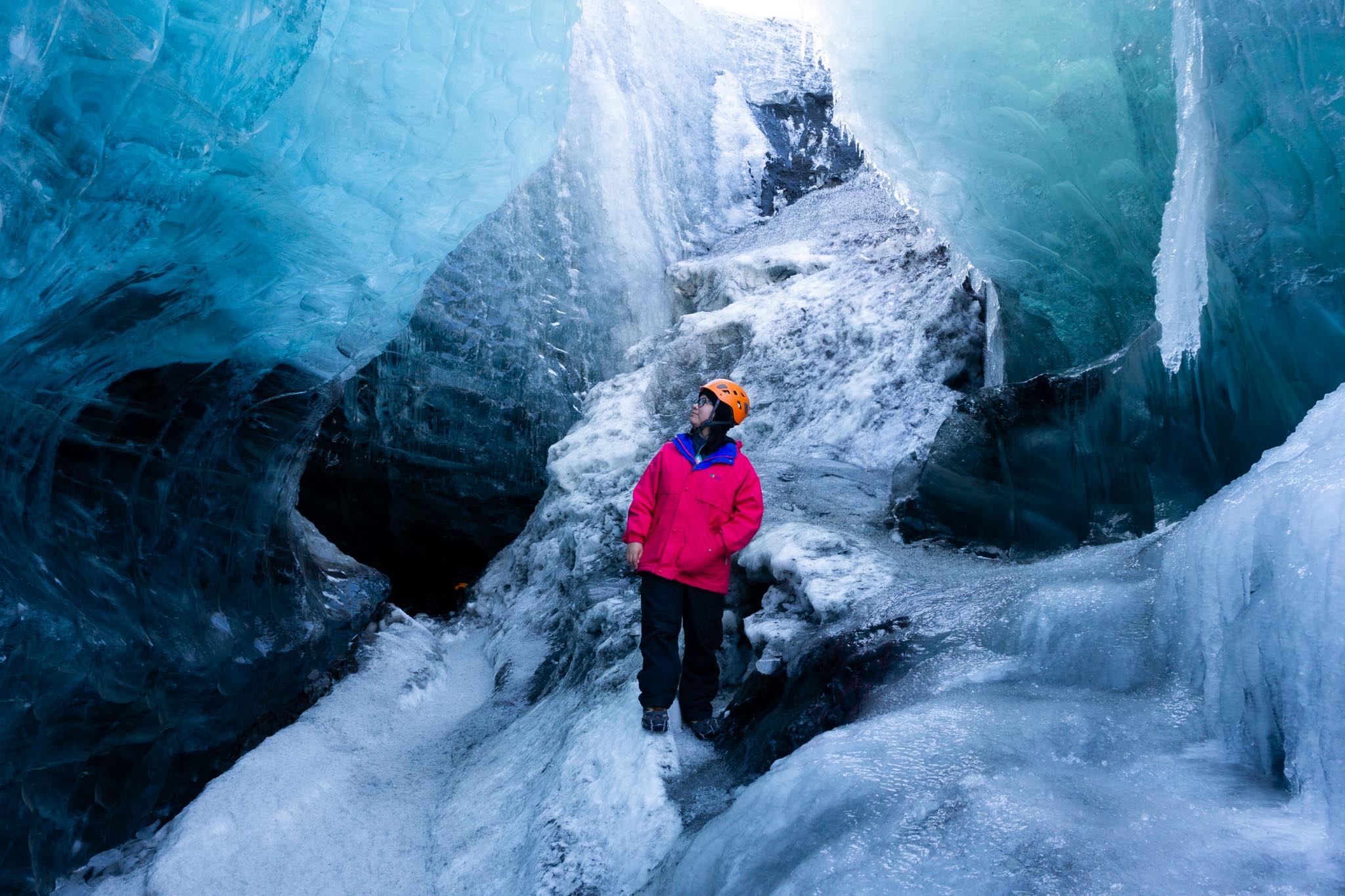 woman on ice cave tour in Iceland