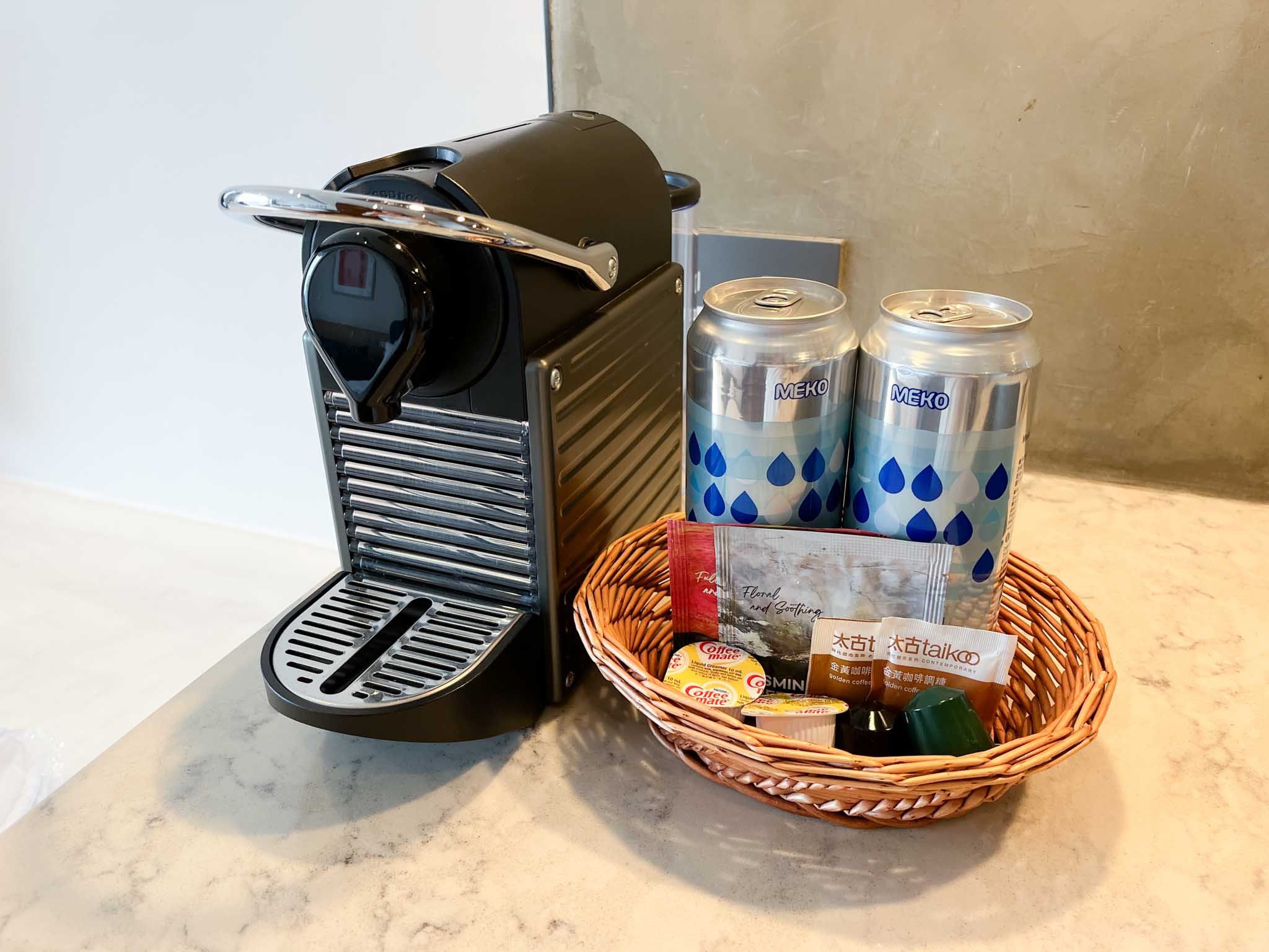 Nespresso, tea bags and canned water